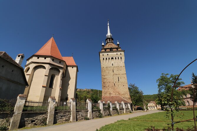 3 Days UNESCO Tour of Transylvania. Private tour from Bucharest - Sighișoara at golden wandering time: Clock Tower, Covered Stairs, and Vlad Tepes lore
