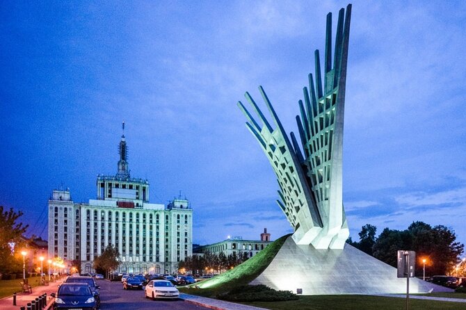 4h Bucharest Panoramic Tour by Car with stops - Triumph Arch and the Free Press, a guided view of shifting eras