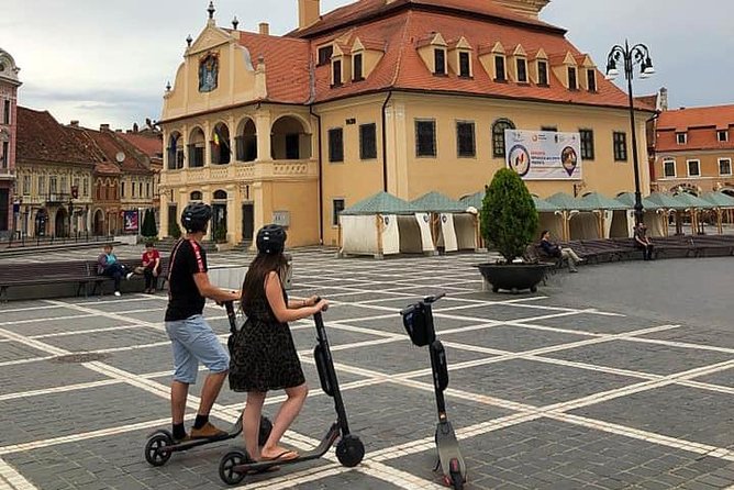 Brasov Old Town Guided Tour With Electric Scooters - What it feels like on the ground, not just on paper