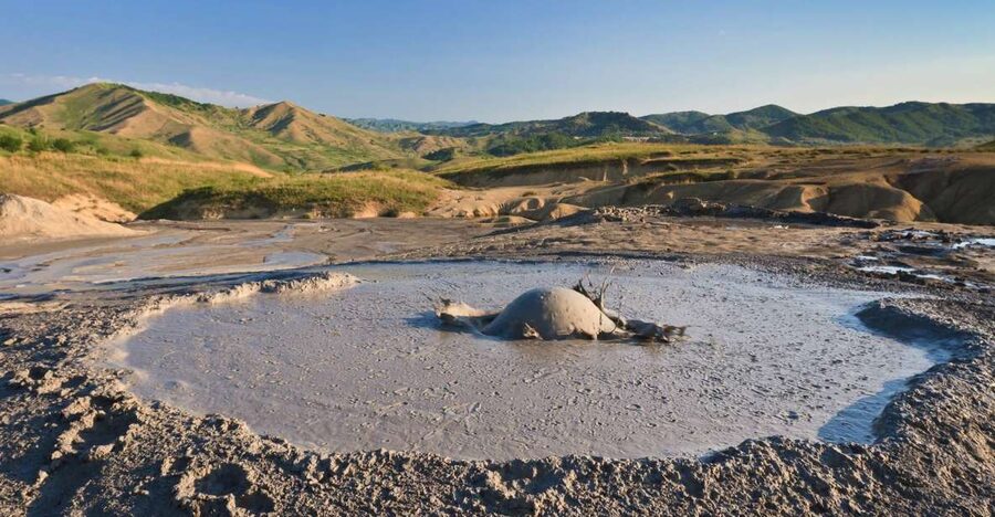 Bucharest: Muddy Volcanoes and Salt Mine Private Day Tour - Berca Mud Volcanoes: Walking Near Cold Cones Built by Deep Earth Gases