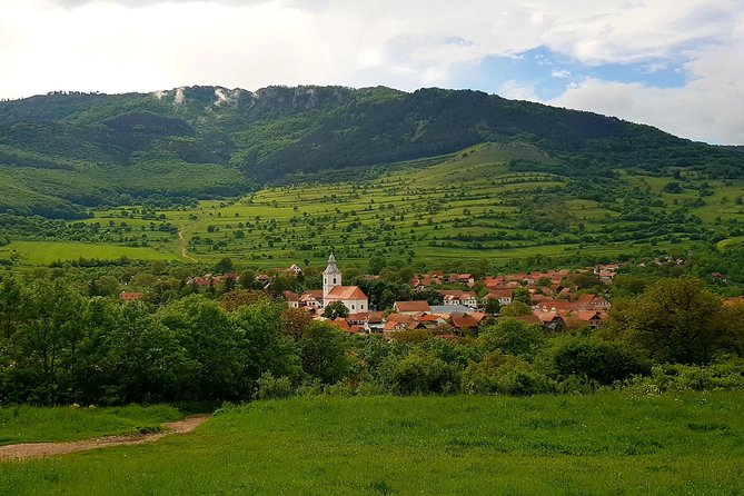 Curly Tour - Day trip from Cluj :) - Rimetea village: white-and-green architecture plus a warm traditional meal
