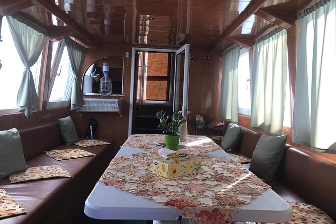 Daily Tours in the Danube Delta - Camely Cruise - Onboard Comfort in Real Delta Weather (Rain, Wind, and the Salon)