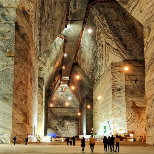 Day Trip Bucharest to Slanic Prahova Salt Mine - Entering Slănic Prahova Salt Mine, scale you can feel