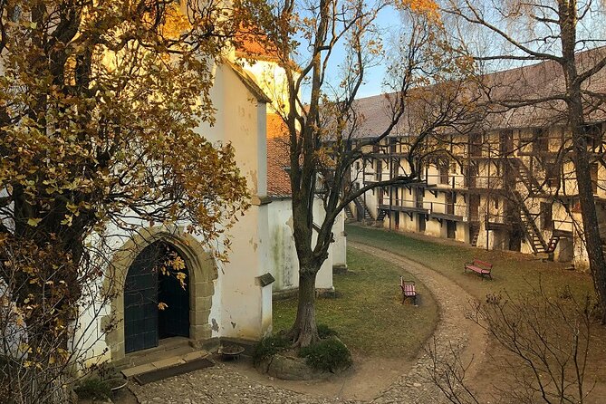Experience the History of Bran Castle and Saxon Fortifications in Burzenland - Harman fortified church: Roman basilica roots with Gothic and moat defenses