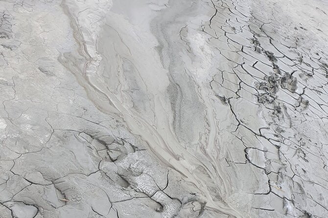 Muddy Volcanoes and Salt Mine Private Full-Day Tour from Bucharest - Salty Science First: Vulcanii Noroiosi Mud Volcanoes Near Berca