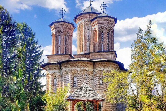 Mystical Monasteries, Dracula's Tomb and Mogosoaia Lake Palace - Private Tour - City monuments you just pass, but still learn from