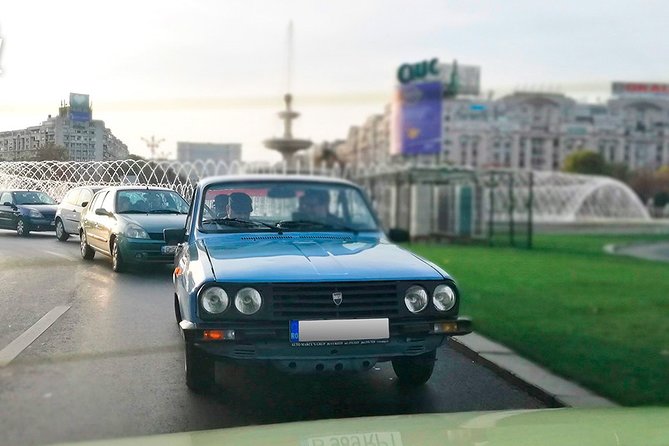 Private -RedPatrol Tour of Bucharest with a Romanian Vintage Car - House of the Free Press: propaganda, plus a satisfying final ride
