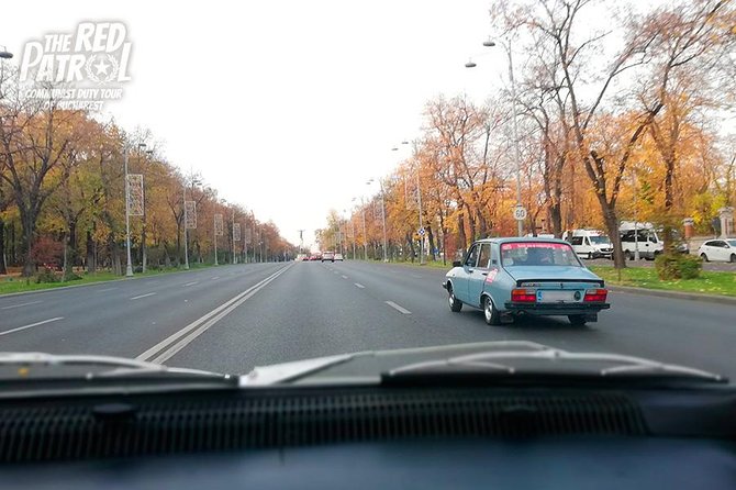 Private - Romanian Vintage Car Driving Tour of Bucharest 120 min - The Palace of Parliament stop: Constitution Square and the 70s to 80s story
