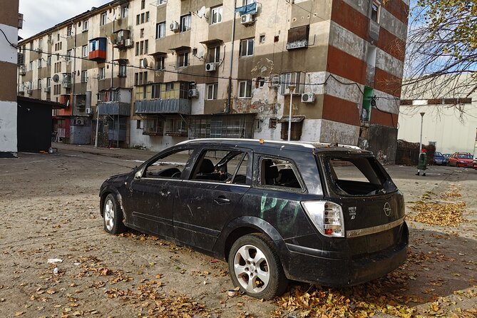 Troubled - Notorious Neighborhood - area known for social issues - The guides: Sebastian, Bogdan, Catalin, and Valerica set the tone